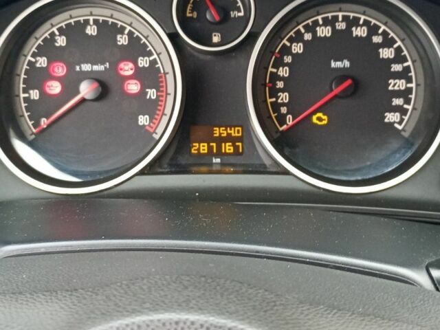 Серый Опель Астра, объемом двигателя 1.6 л и пробегом 287 тыс. км за 3900 $, фото 13 на Automoto.ua