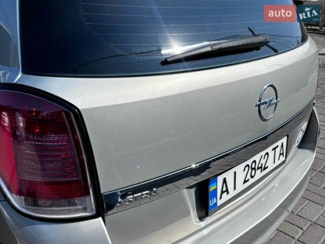 Серый Опель Астра, объемом двигателя 1.8 л и пробегом 212 тыс. км за 7000 $, фото 19 на Automoto.ua