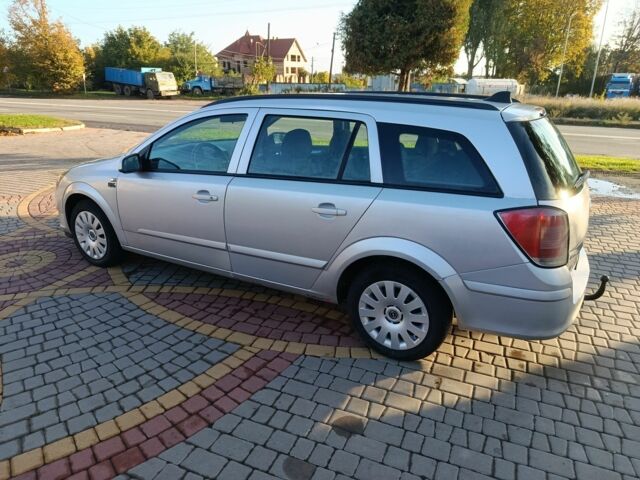 Серый Опель Астра, объемом двигателя 1.8 л и пробегом 260 тыс. км за 4250 $, фото 3 на Automoto.ua