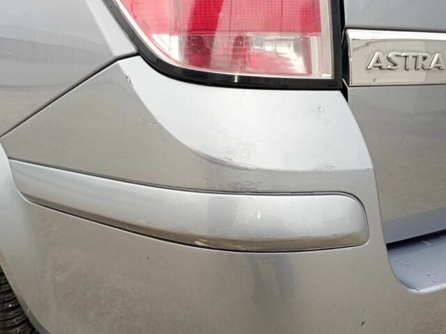 Серый Опель Астра, объемом двигателя 1.6 л и пробегом 287 тыс. км за 3900 $, фото 6 на Automoto.ua