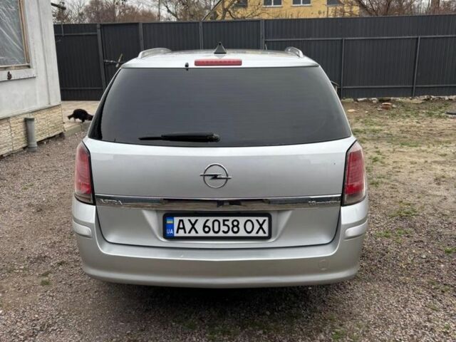 Серый Опель Астра, объемом двигателя 1.6 л и пробегом 245 тыс. км за 5450 $, фото 4 на Automoto.ua