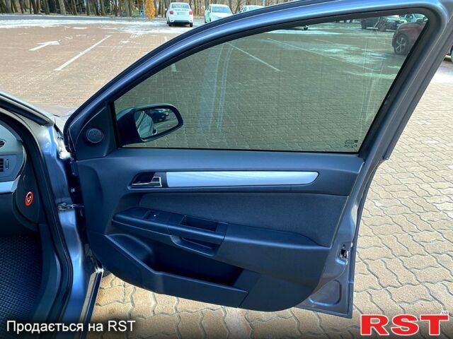 Серый Опель Астра, объемом двигателя 1.4 л и пробегом 243 тыс. км за 5200 $, фото 10 на Automoto.ua