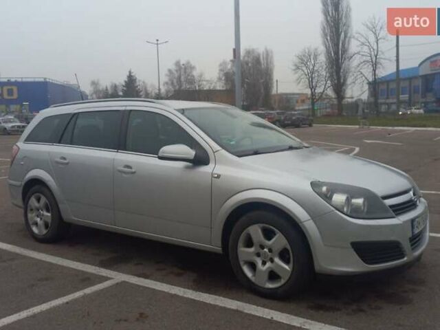 Серый Опель Астра, объемом двигателя 1.6 л и пробегом 227 тыс. км за 4600 $, фото 2 на Automoto.ua