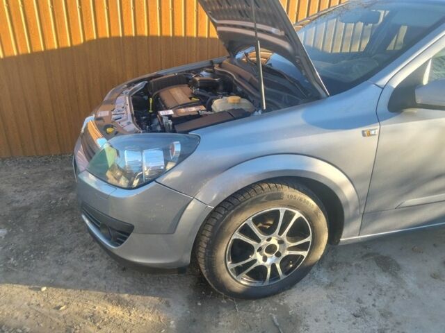 Серый Опель Астра, объемом двигателя 1 л и пробегом 240 тыс. км за 4200 $, фото 6 на Automoto.ua