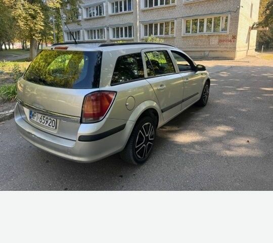 Серый Опель Астра, объемом двигателя 1.3 л и пробегом 340 тыс. км за 2600 $, фото 4 на Automoto.ua