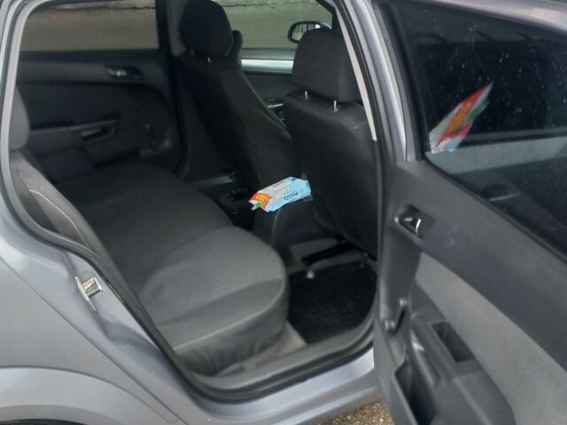 Серый Опель Астра, объемом двигателя 1.6 л и пробегом 320 тыс. км за 3500 $, фото 4 на Automoto.ua