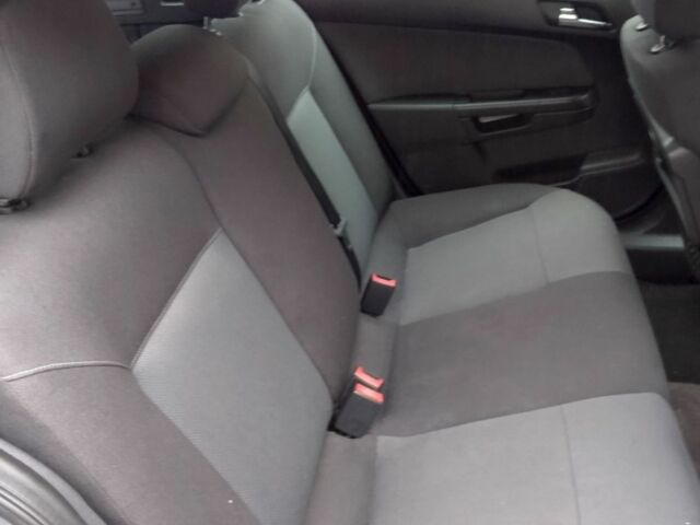 Серый Опель Астра, объемом двигателя 1.8 л и пробегом 215 тыс. км за 5000 $, фото 5 на Automoto.ua