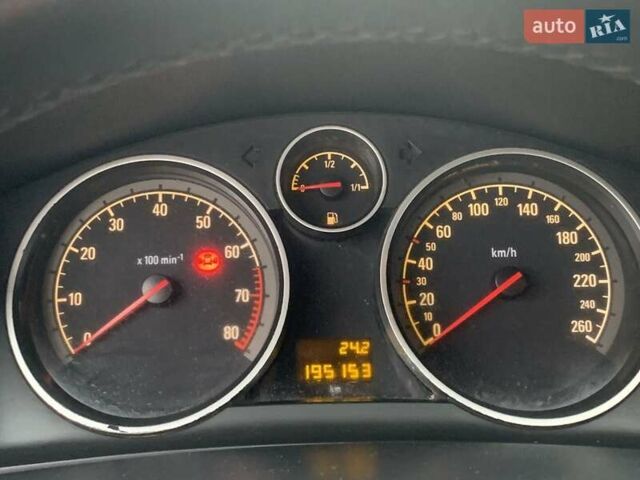 Серый Опель Астра, объемом двигателя 1.6 л и пробегом 195 тыс. км за 4790 $, фото 6 на Automoto.ua