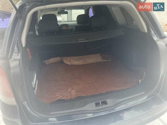 Серый Опель Астра, объемом двигателя 1.25 л и пробегом 212 тыс. км за 5000 $, фото 6 на Automoto.ua