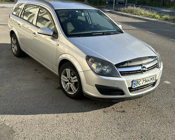 Серый Опель Астра, объемом двигателя 1.2 л и пробегом 380 тыс. км за 4100 $, фото 2 на Automoto.ua