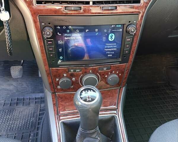 Серый Опель Астра, объемом двигателя 1.4 л и пробегом 311 тыс. км за 4500 $, фото 11 на Automoto.ua