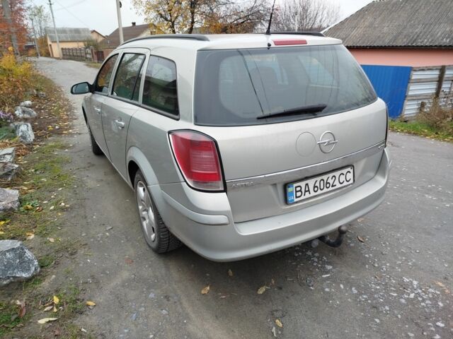 Серый Опель Астра, объемом двигателя 1.2 л и пробегом 300 тыс. км за 3300 $, фото 4 на Automoto.ua