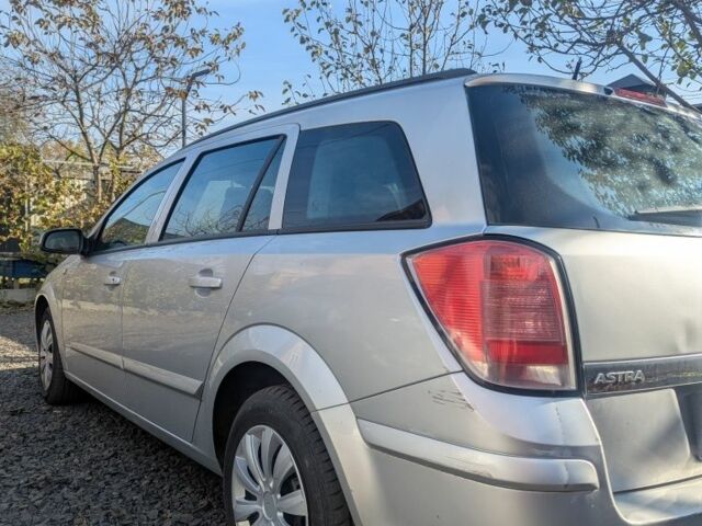 Серый Опель Астра, объемом двигателя 1.6 л и пробегом 197 тыс. км за 4000 $, фото 2 на Automoto.ua