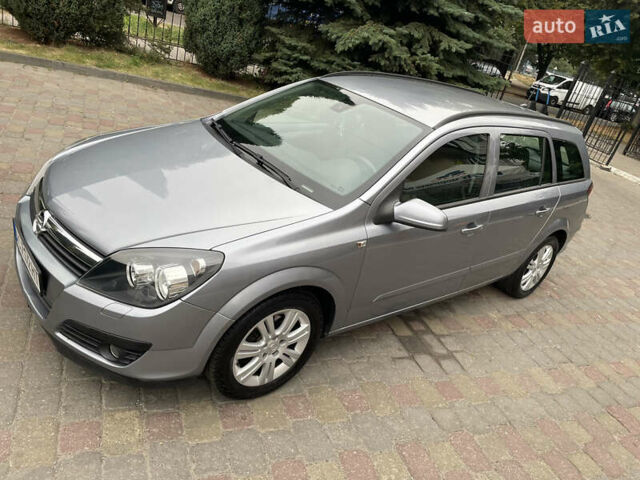 Серый Опель Астра, объемом двигателя 1.8 л и пробегом 243 тыс. км за 5900 $, фото 8 на Automoto.ua