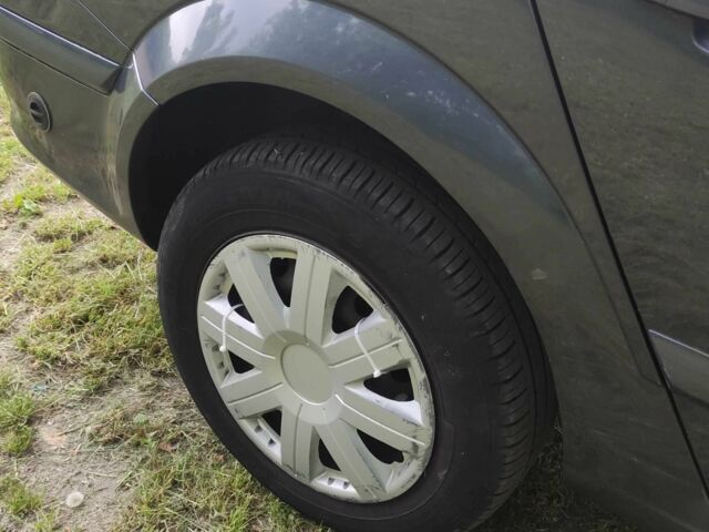 Серый Опель Астра, объемом двигателя 1.6 л и пробегом 280 тыс. км за 4800 $, фото 7 на Automoto.ua