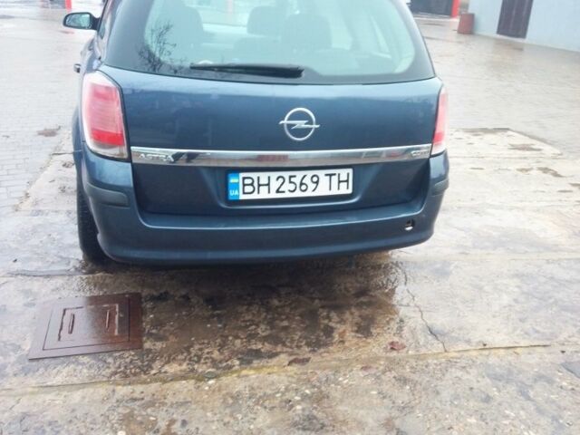 Серый Опель Астра, объемом двигателя 1.2 л и пробегом 425 тыс. км за 4200 $, фото 2 на Automoto.ua