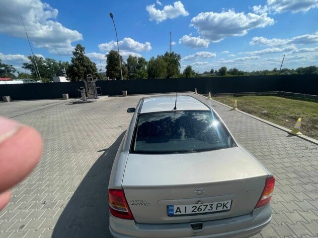 Серый Опель Астра, объемом двигателя 1.4 л и пробегом 320 тыс. км за 4000 $, фото 4 на Automoto.ua