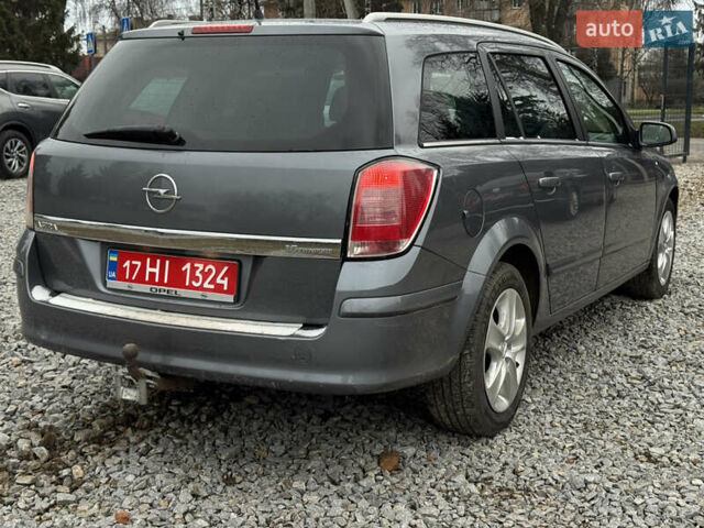 Серый Опель Астра, объемом двигателя 1.6 л и пробегом 310 тыс. км за 5000 $, фото 7 на Automoto.ua