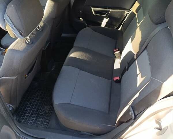 Серый Опель Астра, объемом двигателя 1.4 л и пробегом 311 тыс. км за 4500 $, фото 7 на Automoto.ua