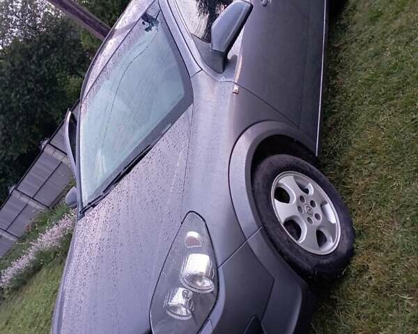 Серый Опель Астра, объемом двигателя 1.3 л и пробегом 277 тыс. км за 5100 $, фото 1 на Automoto.ua