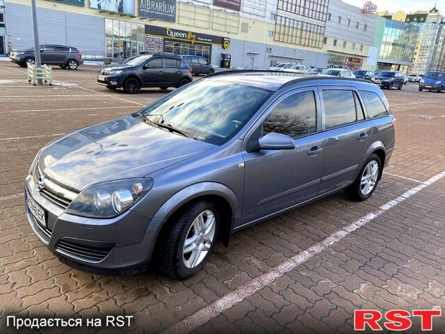 Серый Опель Астра, объемом двигателя 1.4 л и пробегом 243 тыс. км за 5200 $, фото 3 на Automoto.ua