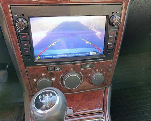 Серый Опель Астра, объемом двигателя 1.4 л и пробегом 311 тыс. км за 4500 $, фото 10 на Automoto.ua