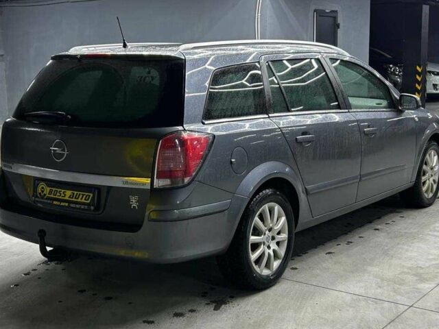 Серый Опель Астра, объемом двигателя 1.6 л и пробегом 249 тыс. км за 5700 $, фото 5 на Automoto.ua