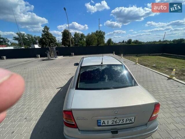 Серый Опель Астра, объемом двигателя 1.4 л и пробегом 320 тыс. км за 4000 $, фото 3 на Automoto.ua