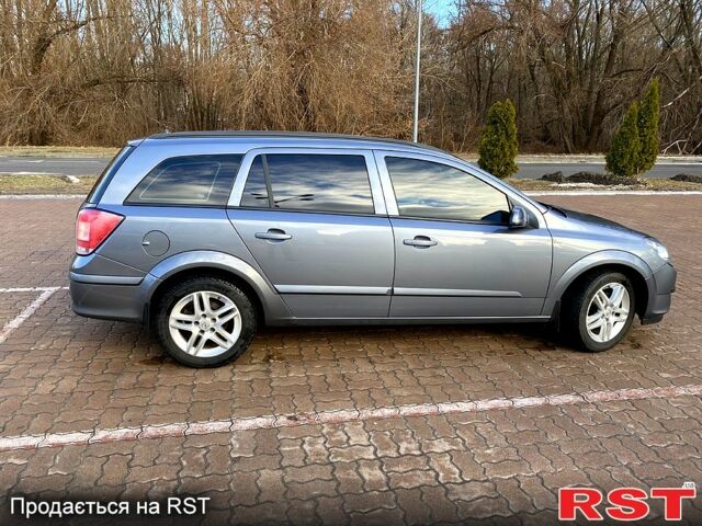 Серый Опель Астра, объемом двигателя 1.4 л и пробегом 243 тыс. км за 5200 $, фото 6 на Automoto.ua