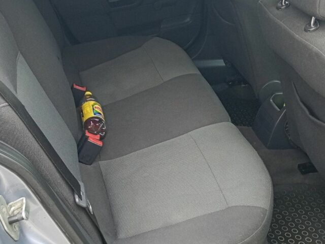 Серый Опель Астра, объемом двигателя 1.6 л и пробегом 287 тыс. км за 3900 $, фото 11 на Automoto.ua