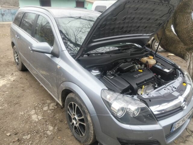 Серый Опель Астра, объемом двигателя 1 л и пробегом 240 тыс. км за 4200 $, фото 5 на Automoto.ua