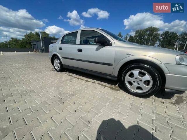 Серый Опель Астра, объемом двигателя 1.4 л и пробегом 320 тыс. км за 4000 $, фото 6 на Automoto.ua