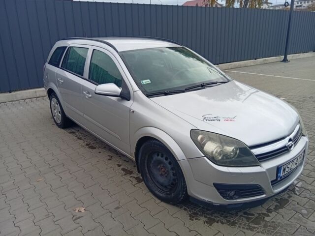 Серый Опель Астра, объемом двигателя 1.7 л и пробегом 273 тыс. км за 1800 $, фото 1 на Automoto.ua