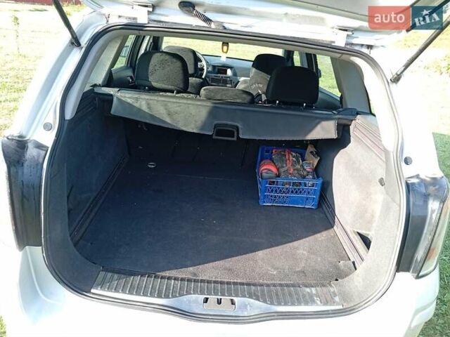 Серый Опель Астра, объемом двигателя 1.9 л и пробегом 258 тыс. км за 4400 $, фото 1 на Automoto.ua