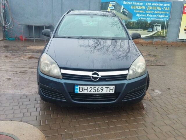 Серый Опель Астра, объемом двигателя 1.2 л и пробегом 425 тыс. км за 4200 $, фото 1 на Automoto.ua