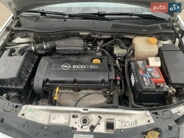 Серый Опель Астра, объемом двигателя 1.6 л и пробегом 195 тыс. км за 4790 $, фото 2 на Automoto.ua