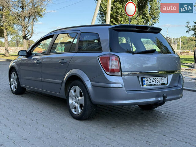 Сірий Опель Астра, об'ємом двигуна 1.91 л та пробігом 228 тис. км за 3999 $, фото 9 на Automoto.ua