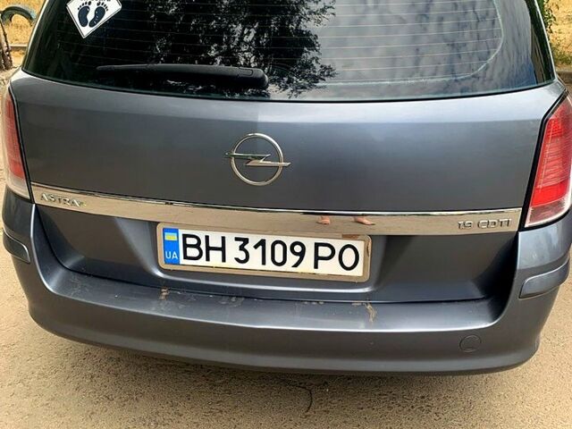 Серый Опель Астра, объемом двигателя 1.9 л и пробегом 370 тыс. км за 5200 $, фото 2 на Automoto.ua