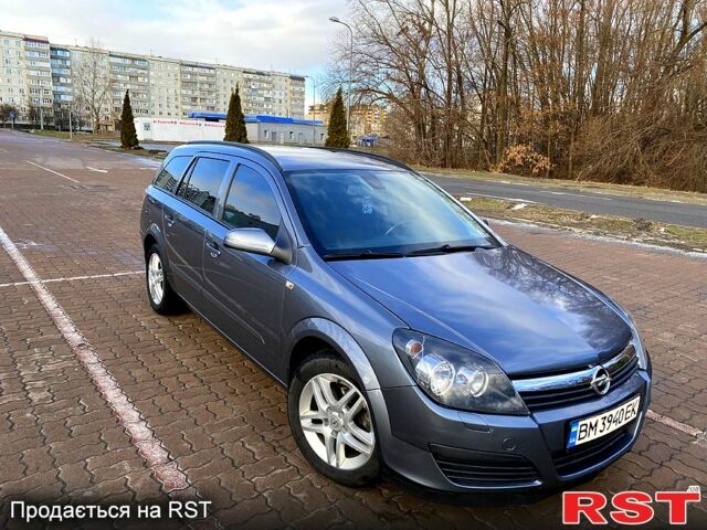Серый Опель Астра, объемом двигателя 1.4 л и пробегом 243 тыс. км за 5200 $, фото 1 на Automoto.ua