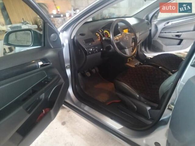 Серый Опель Астра, объемом двигателя 1.6 л и пробегом 240 тыс. км за 4300 $, фото 18 на Automoto.ua