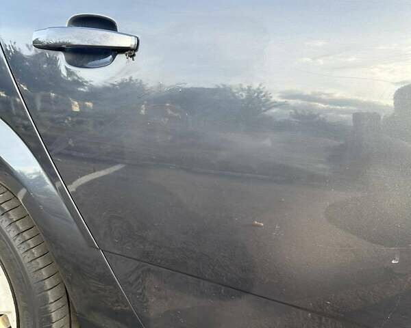 Серый Опель Астра, объемом двигателя 1.2 л и пробегом 323 тыс. км за 4200 $, фото 12 на Automoto.ua