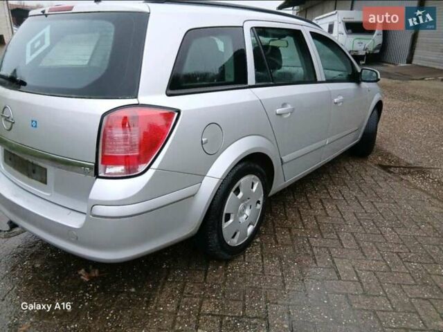 Серый Опель Астра, объемом двигателя 1.8 л и пробегом 218 тыс. км за 4500 $, фото 2 на Automoto.ua