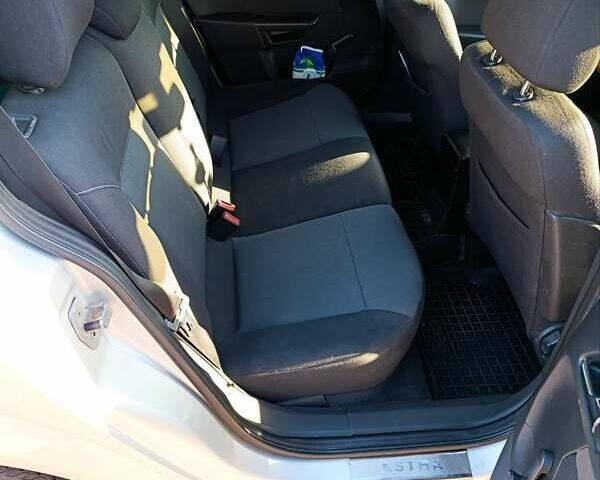 Серый Опель Астра, объемом двигателя 1.4 л и пробегом 311 тыс. км за 4500 $, фото 4 на Automoto.ua