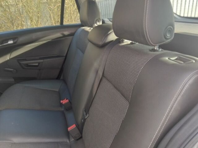 Серый Опель Астра, объемом двигателя 1 л и пробегом 240 тыс. км за 4200 $, фото 2 на Automoto.ua