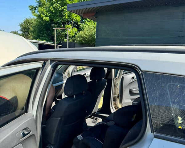 Серый Опель Астра, объемом двигателя 1.9 л и пробегом 320 тыс. км за 4100 $, фото 4 на Automoto.ua