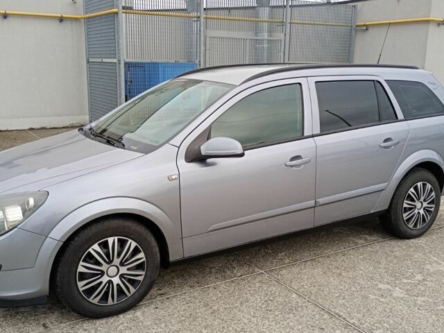 Серый Опель Астра, объемом двигателя 1.6 л и пробегом 287 тыс. км за 3900 $, фото 1 на Automoto.ua