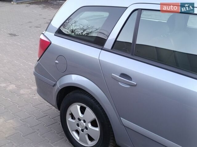 Серый Опель Астра, объемом двигателя 1.6 л и пробегом 258 тыс. км за 5499 $, фото 4 на Automoto.ua