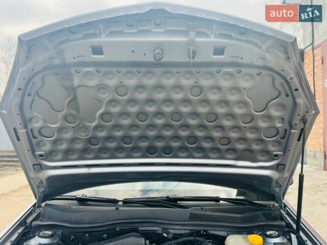 Серый Опель Астра, объемом двигателя 1.6 л и пробегом 194 тыс. км за 4800 $, фото 28 на Automoto.ua