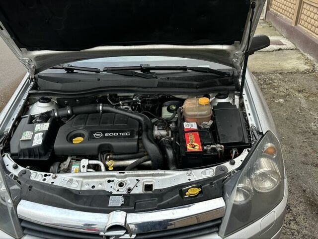 Серый Опель Астра, объемом двигателя 1.7 л и пробегом 290 тыс. км за 1800 $, фото 10 на Automoto.ua