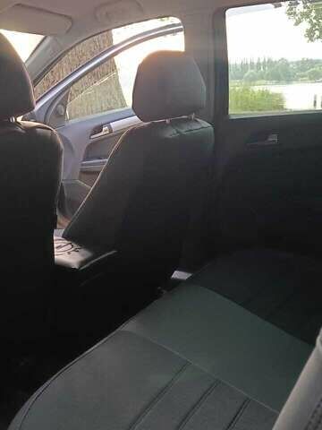 Серый Опель Астра, объемом двигателя 1.6 л и пробегом 240 тыс. км за 5000 $, фото 3 на Automoto.ua